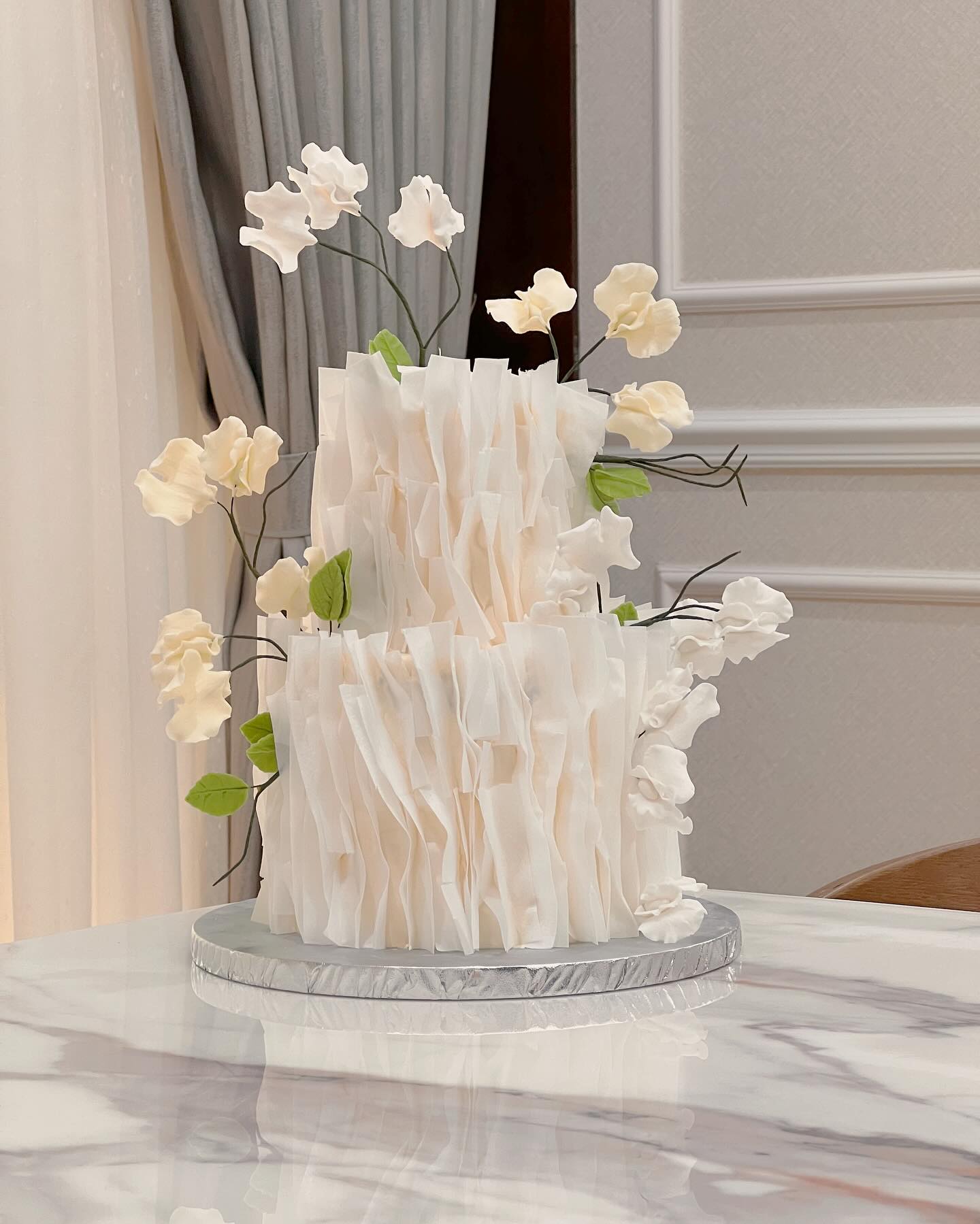 floral and vegetal wafer paper wedding cake